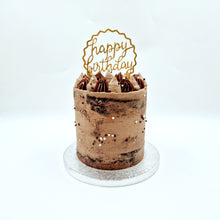 Load image into Gallery viewer, A semi-naked cake features layers of fluffy sponge, adorned with a light buttercream coating, revealing hints of the cake beneath.
