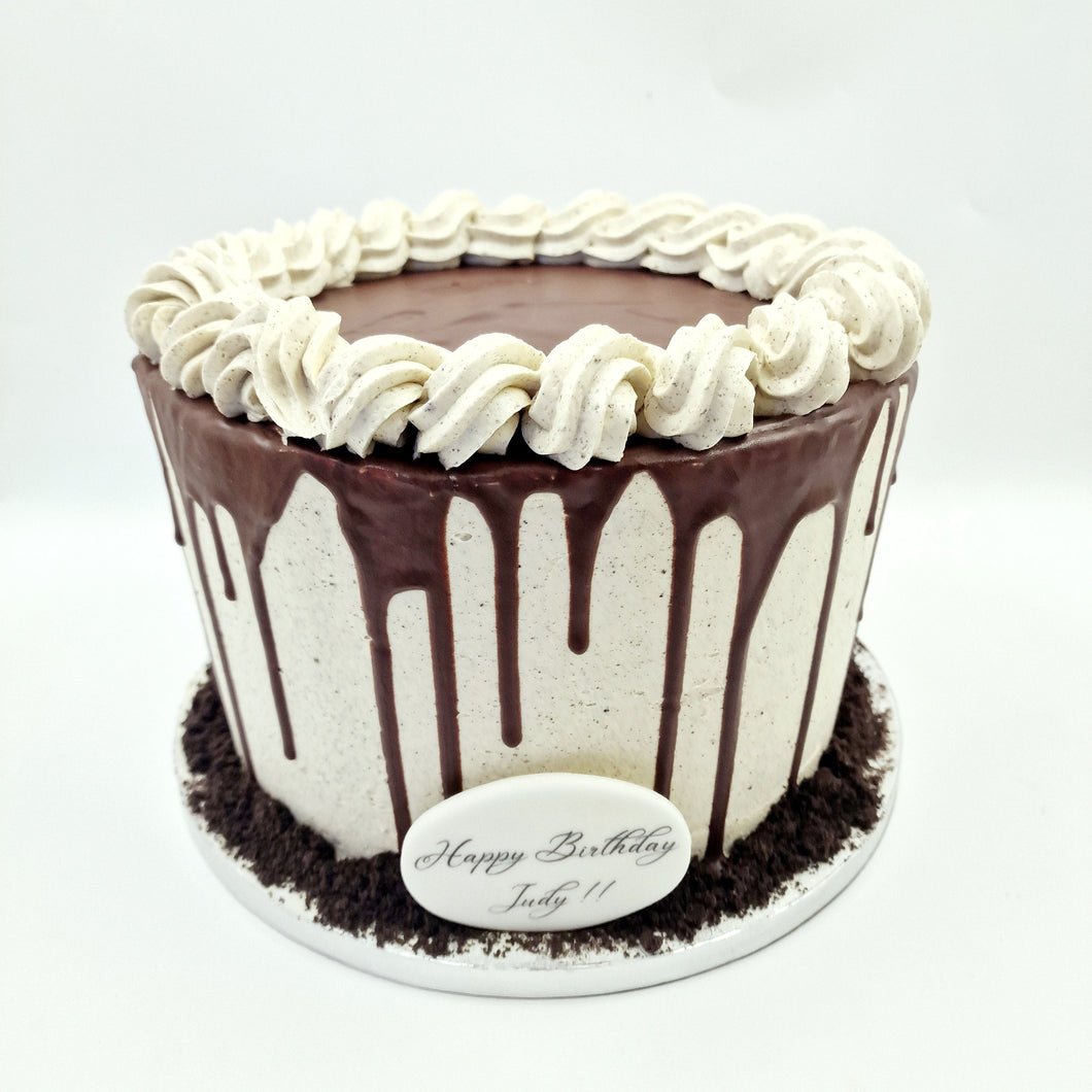 Chocolate cake with vanilla buttercream and crushed Oreo biscuits filling