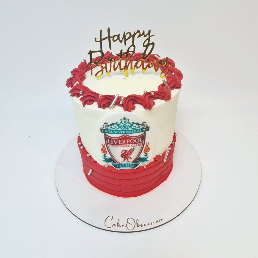 Celebrate any Liverpool fan's special day with our Liverpool Football Cake! This stunning white and red cake is beautifully designed with the iconic Liverpool FC logo, making it a perfect centerpiece for birthdays, match-day parties, or any fan celebration. Crafted with care, this delicious cake combines style and flavor, ensuring it’s as tasty as it is memorable. Order now to delight the Liverpool supporter in your life!