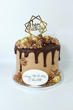 Load image into Gallery viewer, Ferrero Rocher chocolate drip cake. Our Ferrero Rocher Cake is a chocolate lover&#39;s dream come true. It&#39;s a rich and decadent chocolate cake adorned with a luscious chocolate drip and beautifully decorated with delicate swirls and Ferrero Rocher chocolates.
