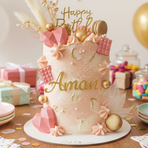 Pink Floral & Macaron Birthday Cake with soft pink buttercream, dried flowers, and macarons, handmade and personalised, perfect for birthdays, anniversaries, and special celebrations, available for delivery in Basildon and Essex.
