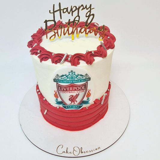 Celebrate any Liverpool fan's special day with our Liverpool Football Cake! This stunning white and red cake is beautifully designed with the iconic Liverpool FC logo, making it a perfect centerpiece for birthdays, match-day parties, or any fan celebration. Crafted with care, this delicious cake combines style and flavor, ensuring it’s as tasty as it is memorable. Order now to delight the Liverpool supporter in your life!
