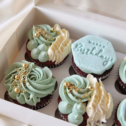Elegant personalised cupcakes with decorative toppers, perfect for birthdays, congratulations and special gifts in Essex.