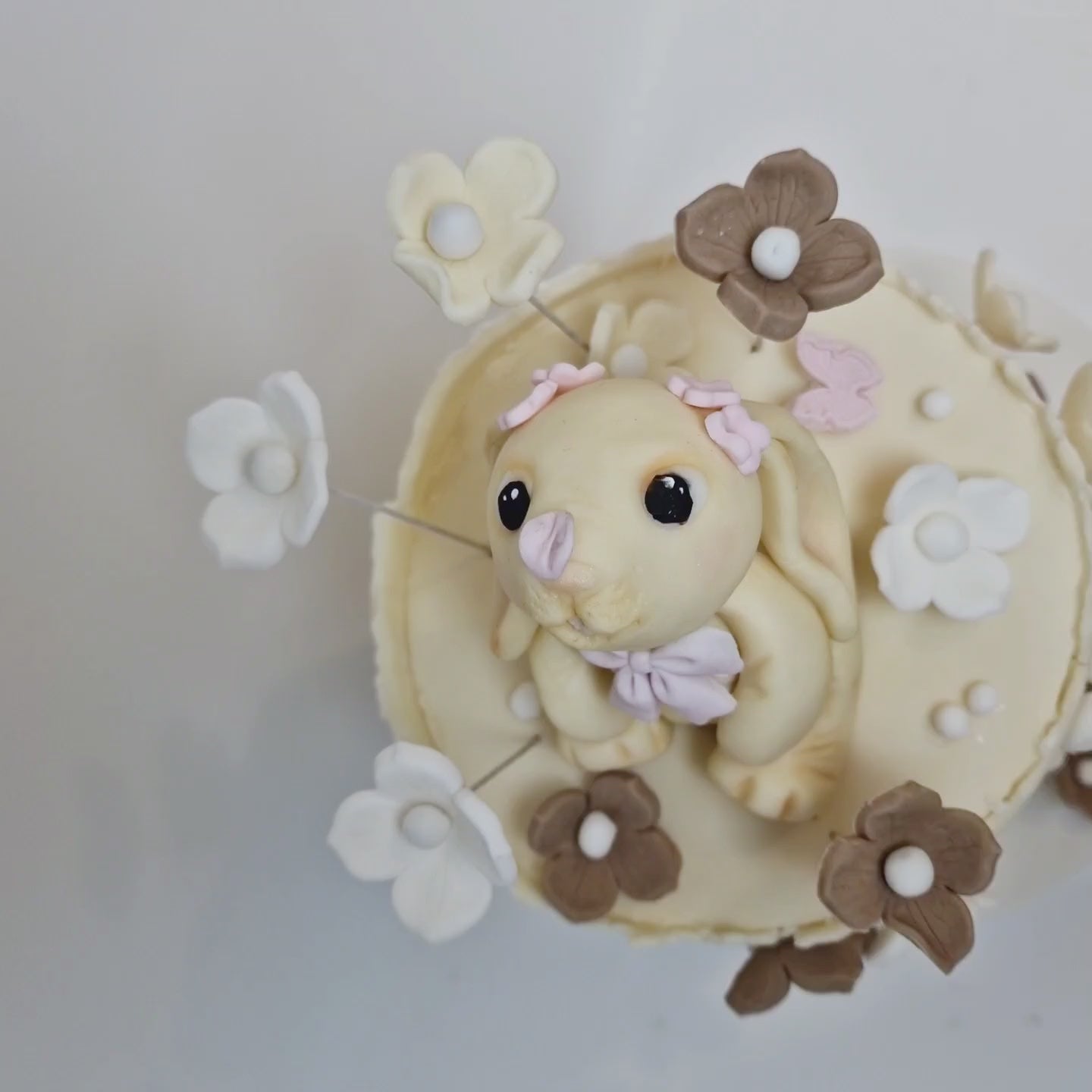 Bunny and floral cake made in Basildon Essex with edible flowers for celebration