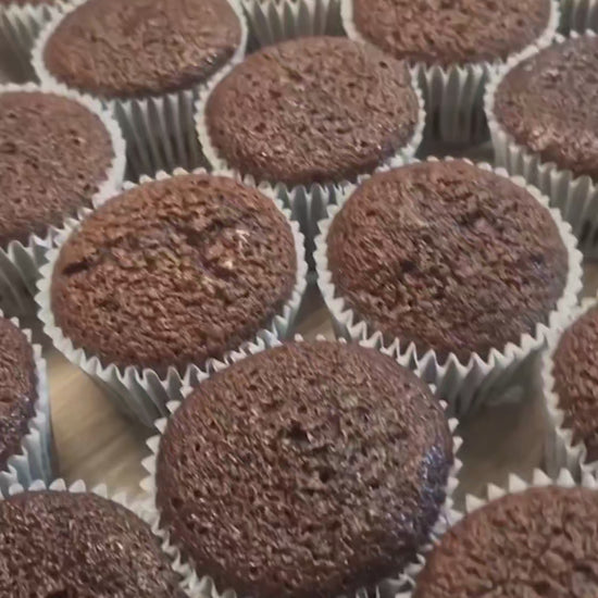 Assorted corporate cupcakes with custom designs, perfect for celebrating business milestones, office events, or colleague birthdays, delivered to your venue.