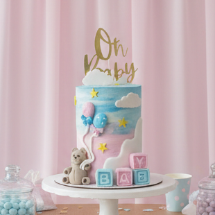 Baby shower cake in Basildon with pastel blue and pink buttercream, teddy bear, baby blocks and Oh Baby topper – Essex cake delivery