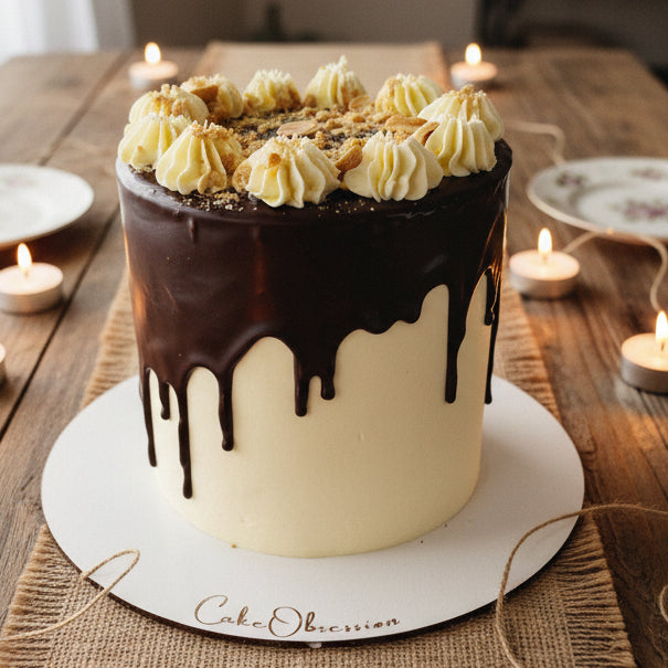 Peanut Butter Drip Celebration Cake with peanut butter sponge, chocolate drip, buttercream swirls, and peanut crumbs, handmade and personalised, perfect for birthdays and special occasions, available for delivery in Basildon and Essex.