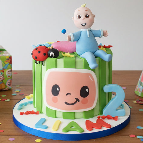 Cocomelon birthday cake in Basildon Essex with colorful fondant, Cocomelon figure, ladybug decoration, personalised with name and age.