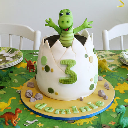 Dinosaur egg cake with fondant dinosaur decorations, kids birthday cake delivery Basildon Essex