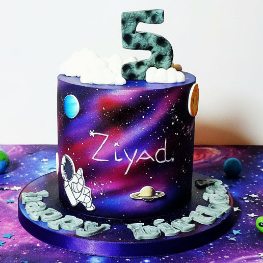 Galaxy Birthday Cake in Basildon, Essex with swirled purple and blue fondant, personalised name and age, space-themed celebration cake