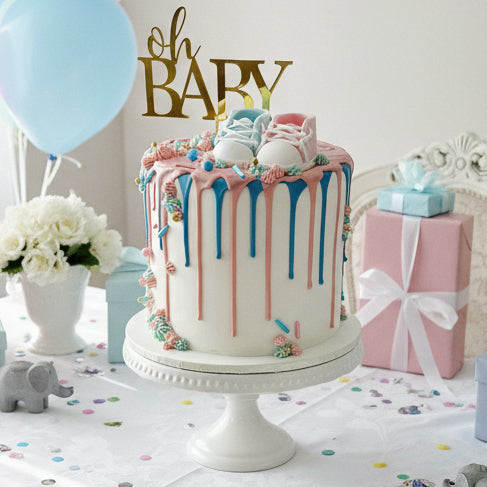 gender reveal cake with pink and blue design and surprise coloured sponge inside, cake delivery Basildon Essex
