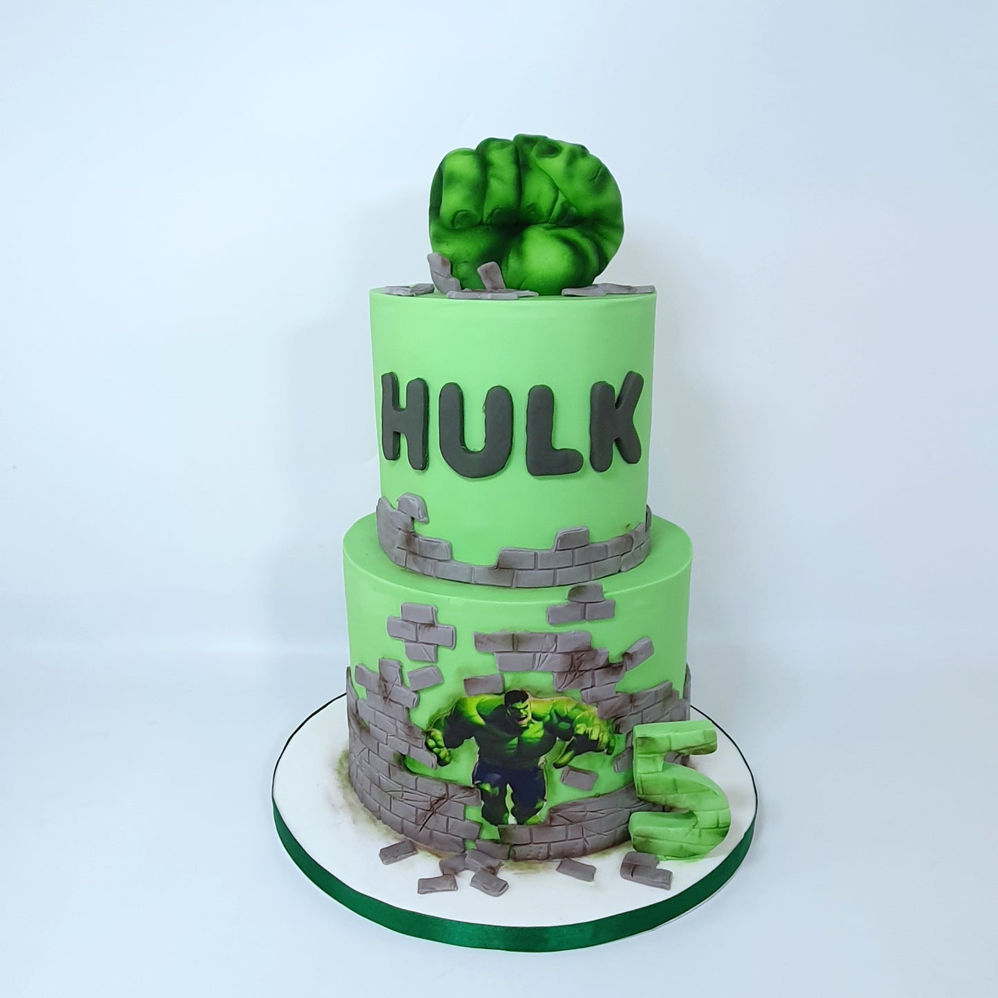Hulk superhero birthday cake with green fondant and Hulk fist decoration, personalised with name and age, cake delivery Basildon Essex
