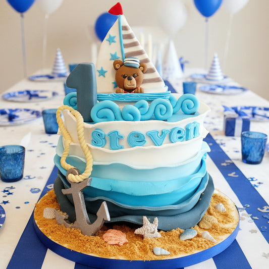 Sailing themed birthday cake with fondant waves, cute bear, anchor, inedible sail, personalised with name and age, delivery Basildon Essex